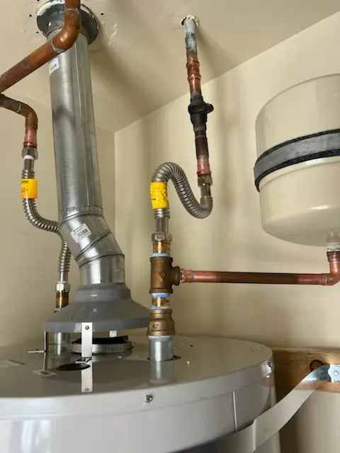Water heater installation and plumbing repair in Flakes Crossing